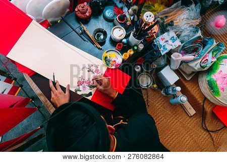 Ho Chi Minh City, Vietnam 01-2018: Vietnamese Scholar Writes Calligraphy At Lunar New Year. Calligra