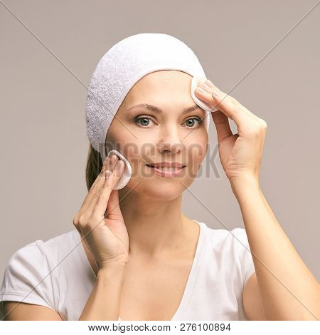 Beauty Woman Natural Makeup. Remove Mascara. Cotton Pad