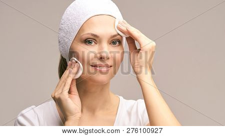 Beauty Woman Natural Makeup. Remove Mascara. Cotton Pad