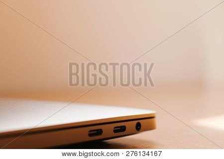 Picture Of A Laptop Taken From The Side With Output Ports