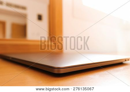 Picture Of A Closed Laptop Taken From The Front