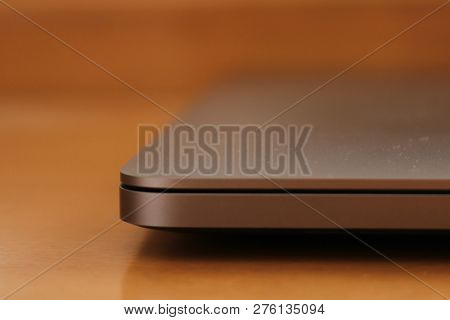 Picture Of A Closed Laptop Taken From Front