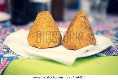 Two Coxinhas (brazilian Chicken Croquettes) On A Plate In Brazil