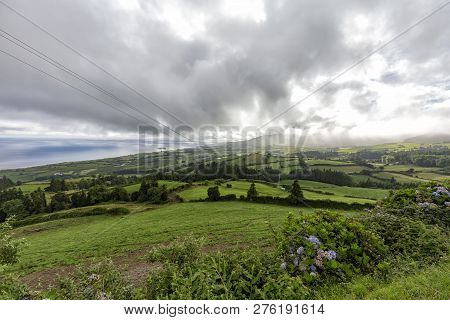 Beautiful View Of The Dramatic Cloudscape Above Vila Franca Do Campo On Sao Miguel, Portugal.