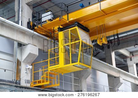 Indoors Overhead Yellow Crane With An Empty Cabin. 12.5 Tones.