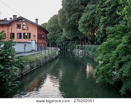Park Near The Canal With A Path For Cyclists And Runners, Europe, Italy,        Cernusco Sul Navigli