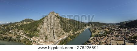 Large Panoramic View Of Sisteron On The Durance River, Rocher De La Baume Opposite The Old Town. Fra
