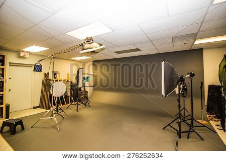 Professional Photography Studio With Backdrop And Lighting