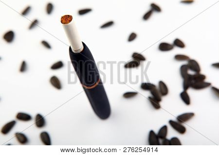 Electronic Smoke Device White Background Sunflowers Seeds Nobody