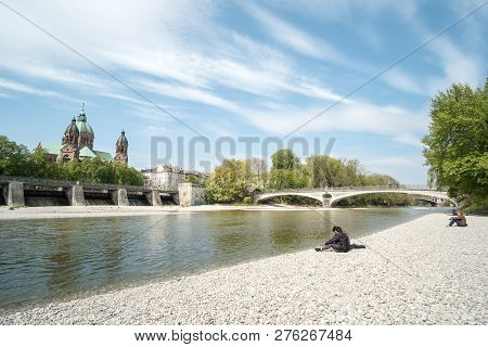 Munich, Germany - 21 April 2017 : View Of Building At The River Bank Of Isar River In Munich. With S