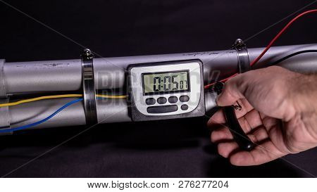 Hand Cutting Wire On Pipe Bomb