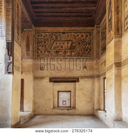 Cairo, Egypt - December 16 2018: Stone Wall With Wooden Window (mashrabiya) And Mural Depicting City