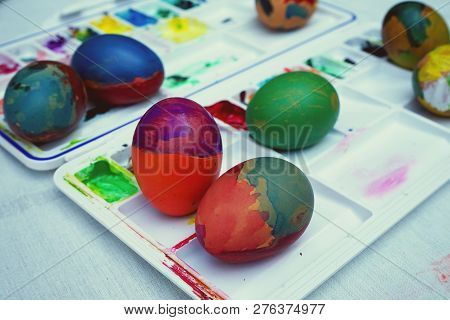 Colorful Easter Eggs Painting Activity With Color Tray Background, Fun Event Concept, Copy Space