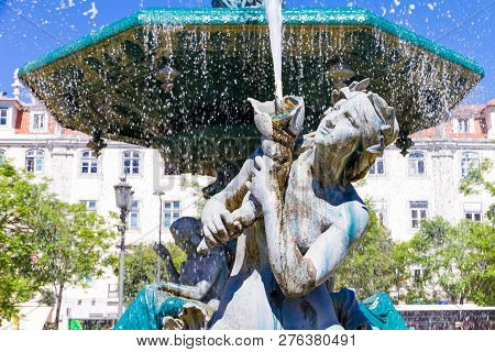 Founta In Rossio Square In The Pombaline Downtown Of Lisbon, In Portugal.
