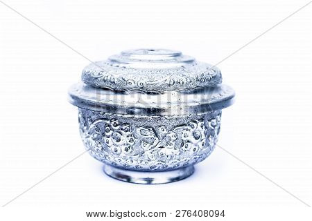 Close Up Of White Or Silver Colored Shiny Container Isolated On White.