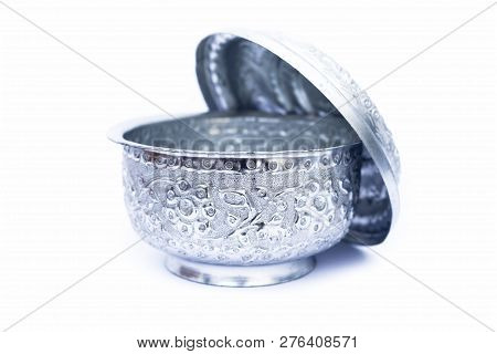 Close Up Of White Or Silver Colored Shiny Container Isolated On White.