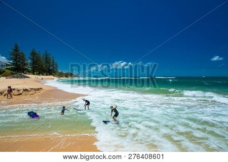 CALOUNDRA, AUS - DEC 28 2018: Hot sunny summer day at Moffat Beach, Calundra, Queensland, Australia