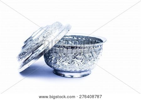 Close Up Of White Or Silver Colored Shiny Container Isolated On White.