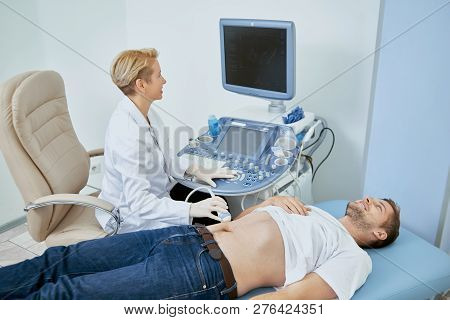 Closeup Crop View Of Patient And Doctor In Office. Professional Doctor Making Diagnosis And Consulti