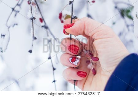 Valentine Day Nail Art Design Manicure. Female Hand With Bright Red Heart Manicure Holding Red Berri