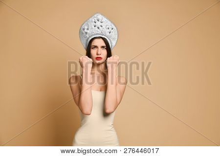 Cute Woman Shows Fist At Camera, Threatens You About Something, Has Displeased Sullen Facial Express