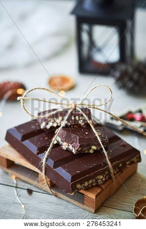 Cllose-up Of Typical Spanish Christmas Chocolate Turron Or Nougat Dessert. New Year And Holidays Sea