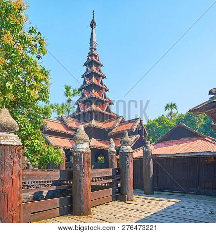 The Massive Timber Fence Of The Medieval Wooden Bagaya Monastery, Located Among The Agricultural Lan