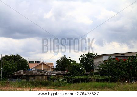 House Ground And Rain Storm On Sky Background