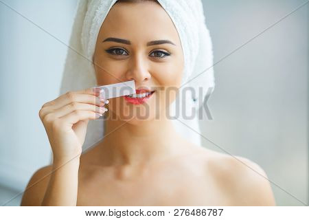 Hair Removal Wax. Young Woman Reciving Facial Epilation