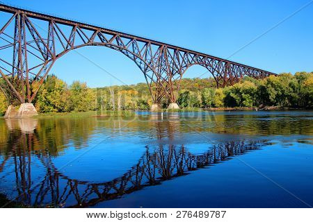 The Arcola Bridge Reflected In The St. Croix
