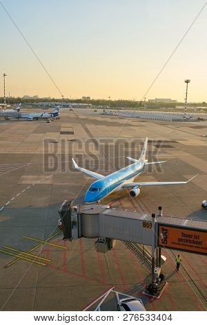 DUSSELDORF, GERMANY - CIRCA OCTOBER, 2018: KLM Cityhopper aircraft on pushback at Dusseldorf Airport.
