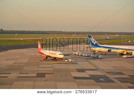 DUSSELDORF, GERMANY - CIRCA OCTOBER, 2018: Airberlin aircraft on pushback at Dusseldorf Airport.