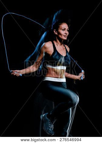 beautiful woman jumping rope fitness exercises isolated black ba
