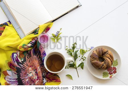 Yellow Scarf ,notebook Planner With Healthy Drinks Ginger Tea And Sweetmeat Bread Of Lifestyle Woman
