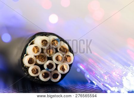 Cross-section Of The Control Cable. Color Code For Residential Wire. The Glowing Garland Lies Nearby