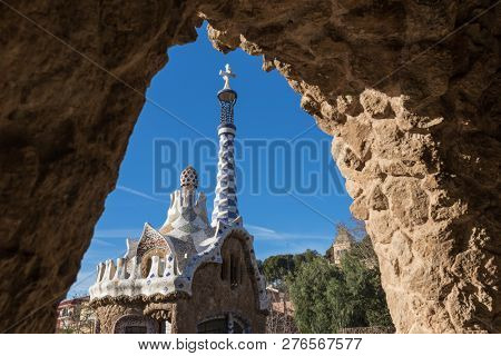 Barcelona, Spain - March 28, 2018: Famous Casa del Guarda in Park Guell in Barcelona, Spain. Top view