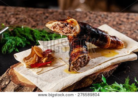 The Concept Of Georgian Cuisine. Recipe For Cooking Meat Lyulya Kebab In The Dough On The Grill. Che