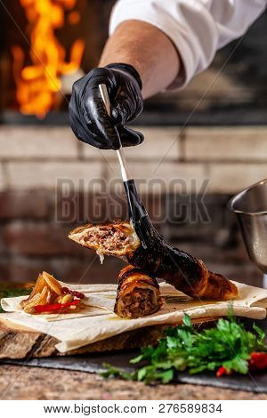 The Concept Of Georgian Cuisine. Recipe For Cooking Meat Lyulya Kebab In The Dough On The Grill. Che