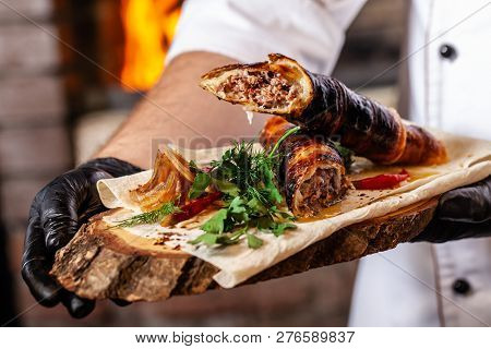 The Concept Of Georgian Cuisine. Recipe For Cooking Meat Lyulya Kebab In The Dough On The Grill. Che