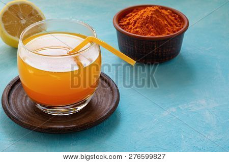 A Warm Drink From Turmeric, Lemon And Honey For Better Health. Immunostimulating Natural Cocktail. C