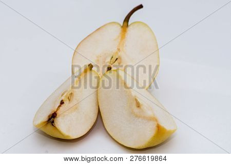 The Slices Of  Organic Pear On The White Background
