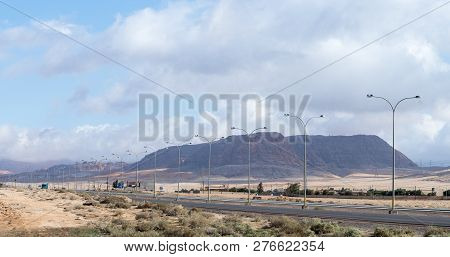 Maan, Jordan, December 07, 2018 : Intercity Route Passing Near The Foot Of The Red Mountains In The 