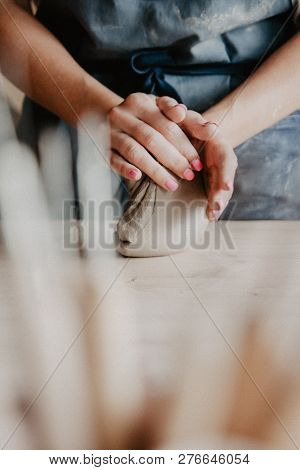 Pottery, Clay, Ceramics Art Concept - Closeup On Hands Of Young Master With The Large Pieces Of Fire