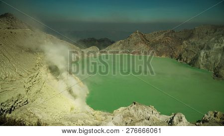 Crater Acid Lake Kawah Ijen Where Sulfur Is Mined. Sulfur Gas, Smoke. Mountain Landscape Ijen Volcan