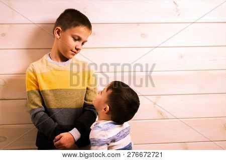 Two Brothers - The Elder Brother And The Younger Brother, Talking In The House Against The Backgroun