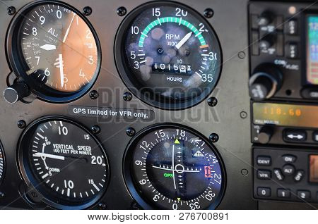 Close Up Of Instrument Panel In An Aircraft, Classic Gages, Altimeter, Vertical Speed Indicator, Hor