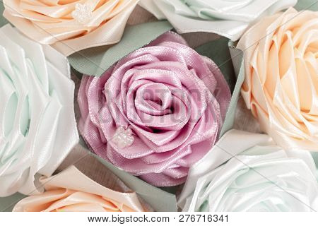 Bouquet, Basket Of Flowers Kanzashi From Satin Ribbons Close Up Background. Japanese Traditional Han