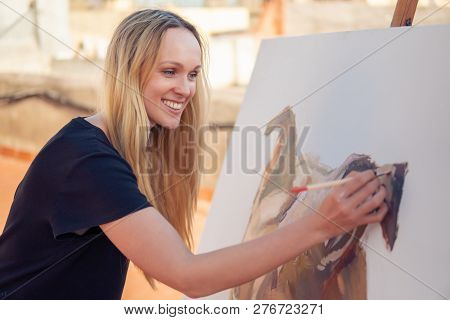 Young Woman Paint Artist Drawing At Home Roof