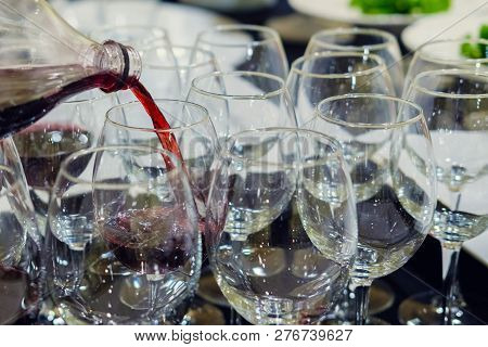 Wine Pouring Down The Glasses, Selective Focus