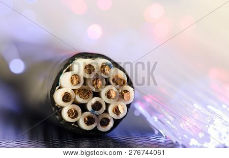 Cross-section Of The Control Cable. Color Code For Residential Wire. The Glowing Garland Lies Nearby